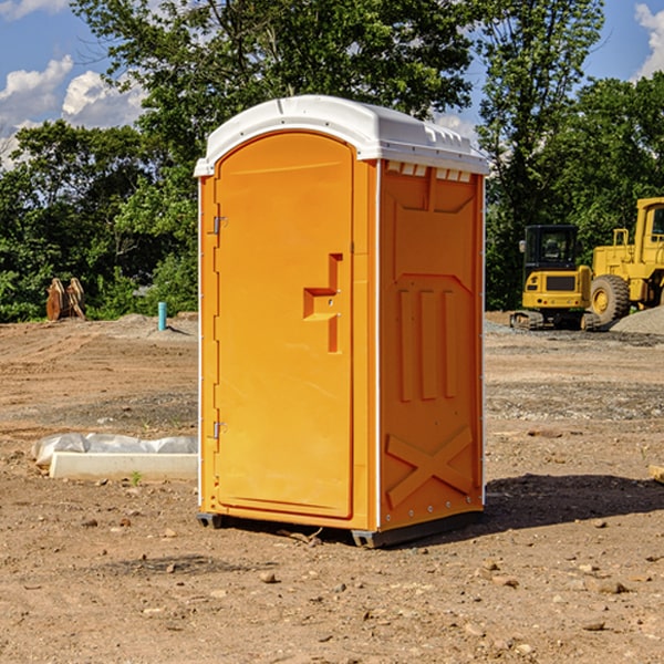 what is the cost difference between standard and deluxe portable restroom rentals in Newton